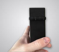 Black Commander deck box side view held in hand for size reference