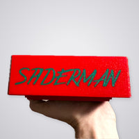 Miles Morales Commander deck box, red and green, side with Spider-Man lettering
